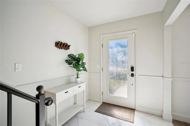 a kitchen with a sink a counter top space and appliances