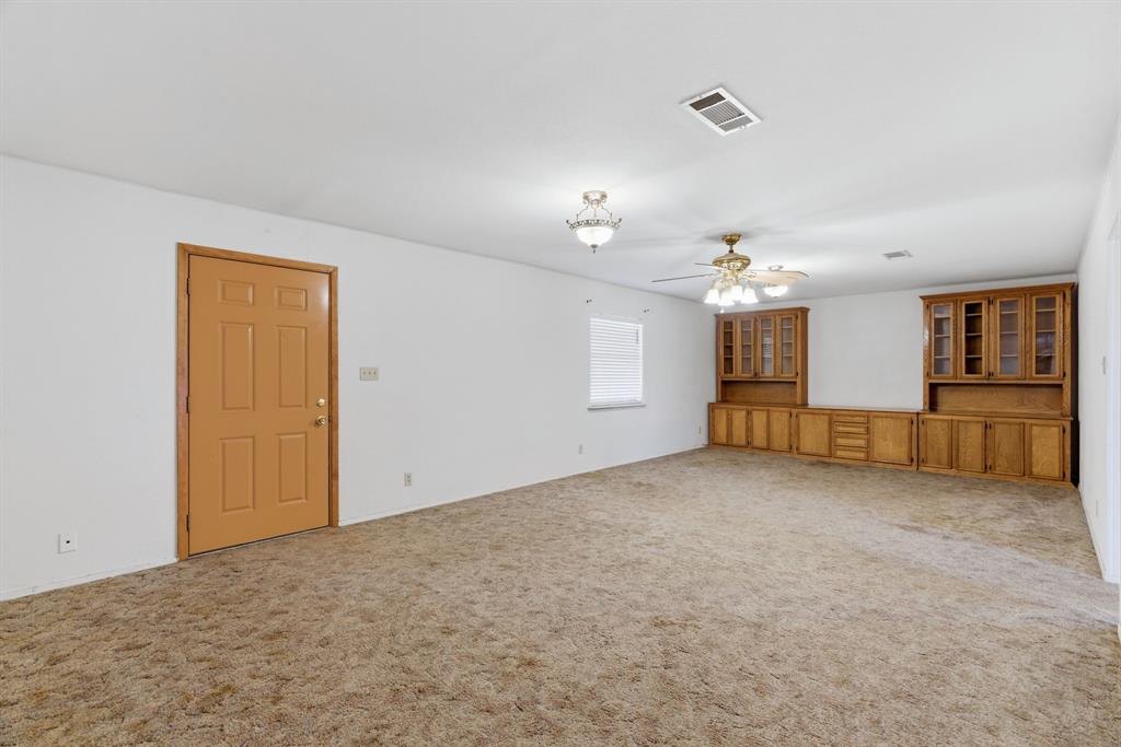 3523 East Highway 199 Springtown, TX 76082 - Photo 9 of 40 Spacious living area featuring built-in cabinetry