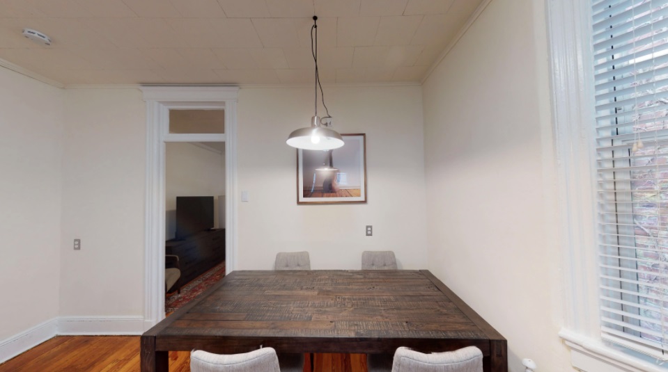 617 Monroe Street, Unit 2 Hoboken, NJ 07030 - Photo 3 of 12 a view of a dining room with a wooden floor