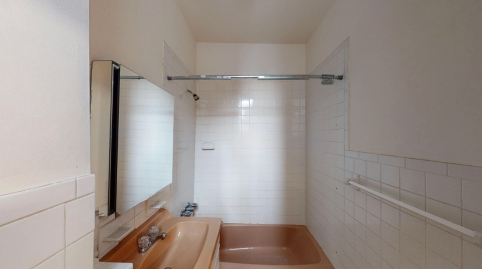 617 Monroe Street, Unit 2 Hoboken, NJ 07030 - Photo 10 of 12 a bathroom with a tub