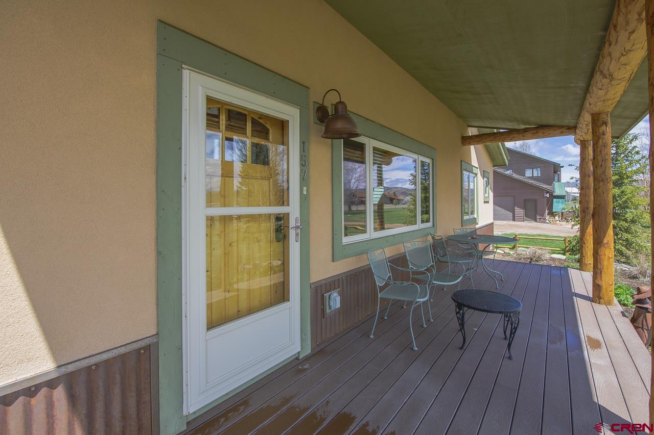 157 Spring Meadow Trail Gunnison, CO 81230 - Photo 13 of 43 a view of a two chairs in the balcony