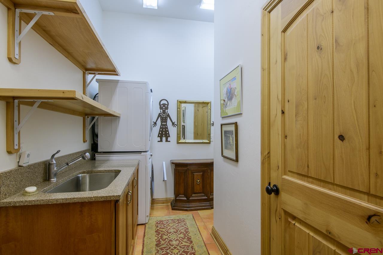 157 Spring Meadow Trail Gunnison, CO 81230 - Photo 24 of 43 a bathroom with a sink a toilet and shower