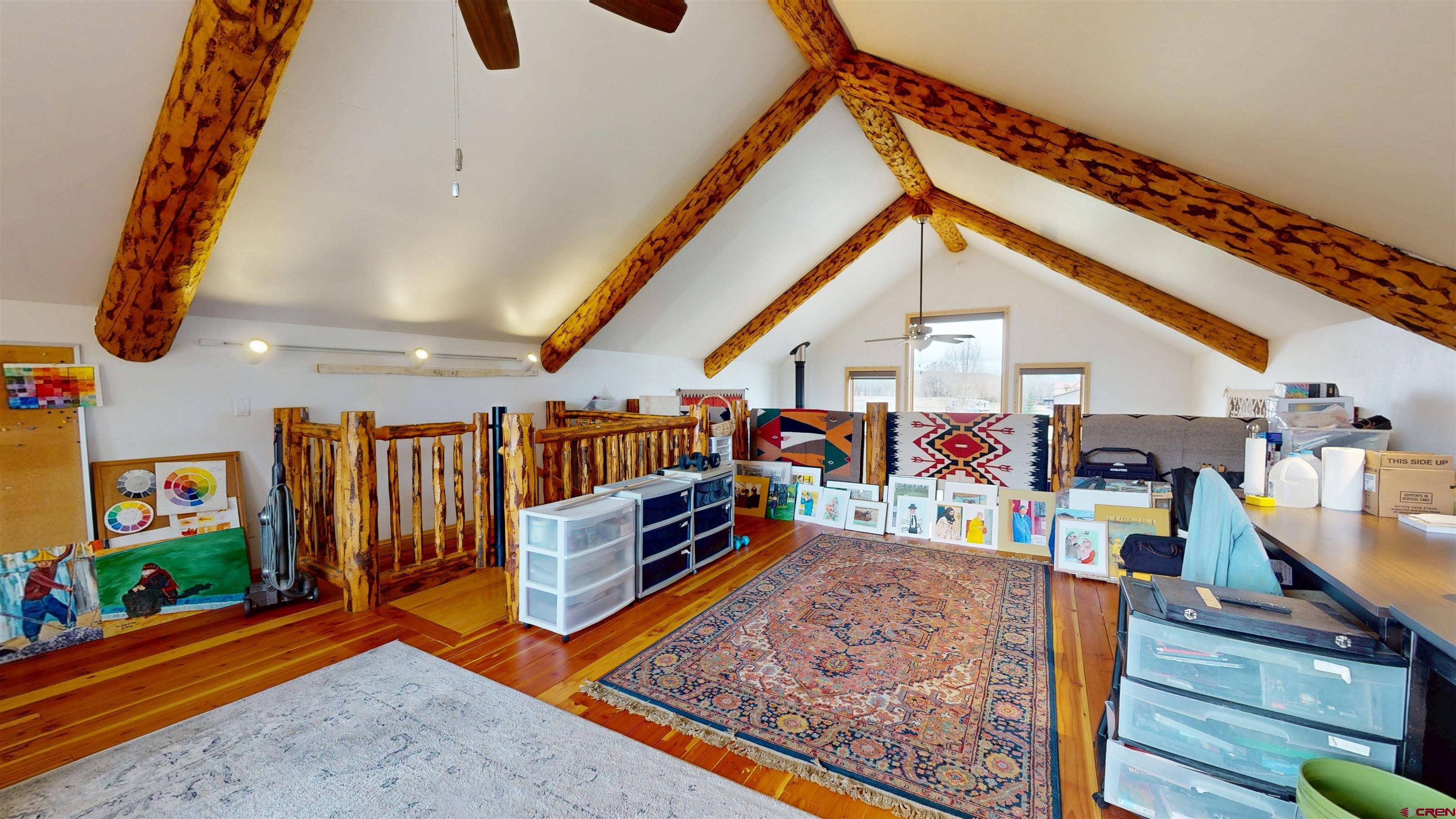 157 Spring Meadow Trail Gunnison, CO 81230 - Photo 38 of 43 a utility room with lots of wooden furniture