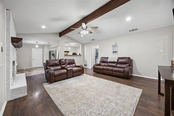 a living room with furniture and a couch