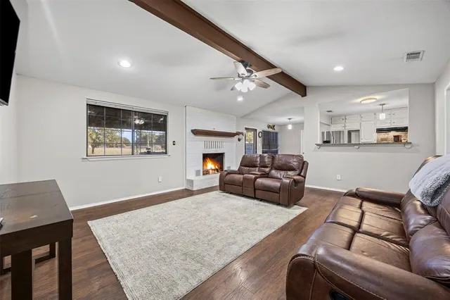 a living room with furniture and a couch