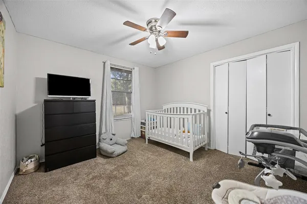 a view of livingroom with furniture and windows