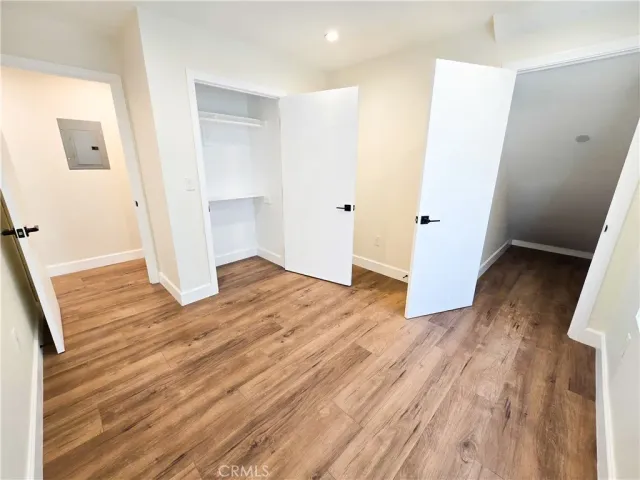 a view of wooden floor in an empty room
