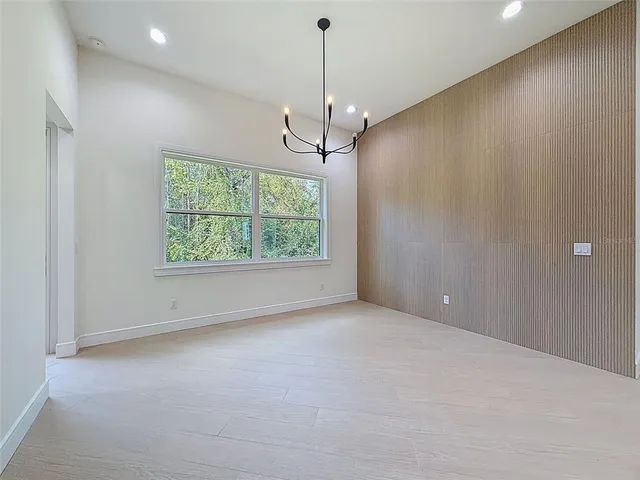a bathroom with a granite countertop sink mirror and double