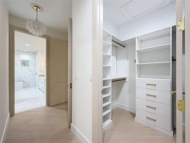 a utility room with sink dryer and washer