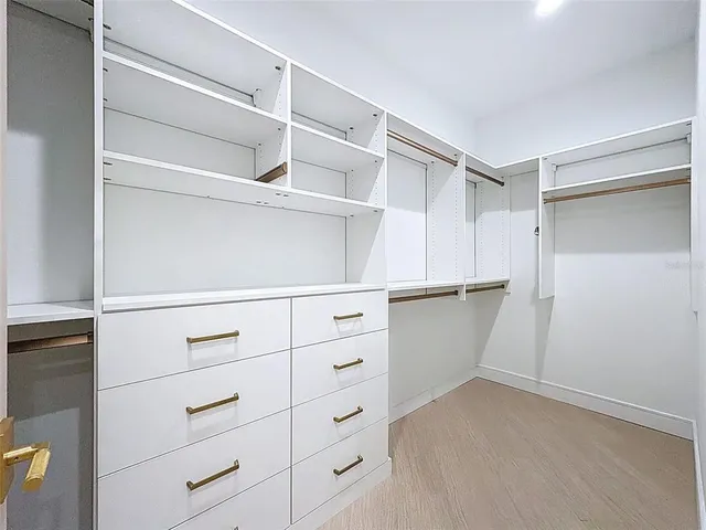 a view of a room that has a window in it