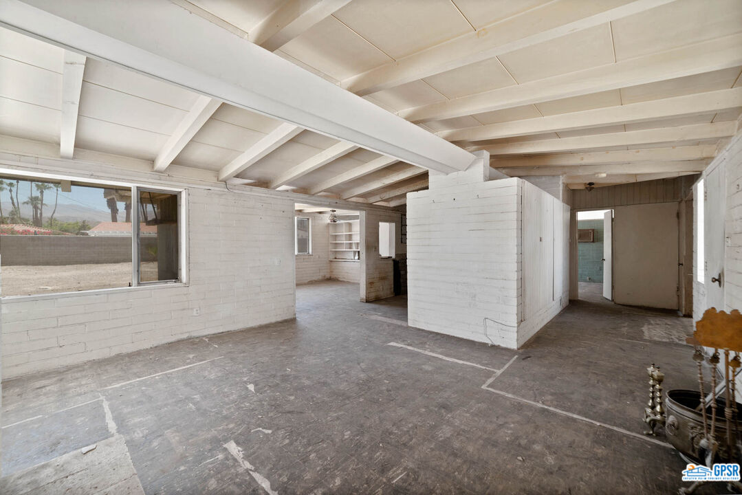 Undisclosed Address Palm Desert, CA 92260 - Photo 12 of 33 a view of a hallway with workspace