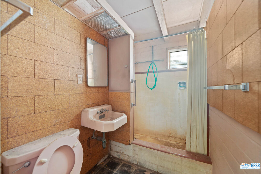 Undisclosed Address Palm Desert, CA 92260 - Photo 18 of 33 a bathroom with a sink toilet and shower