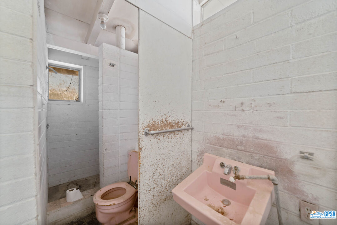 Undisclosed Address Palm Desert, CA 92260 - Photo 21 of 33 a bathroom with a sink a toilet and shower