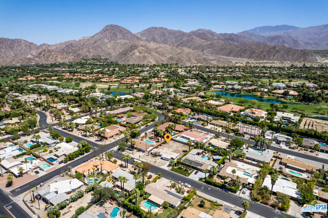 Undisclosed Address Palm Desert, CA 92260 - Photo 32 of 33 an aerial view of residential house and green space