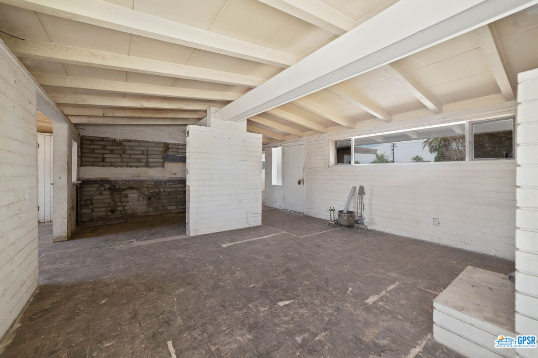 Undisclosed Address Palm Desert, CA 92260 - Photo 6 of 33 a view of a livingroom with an empty space