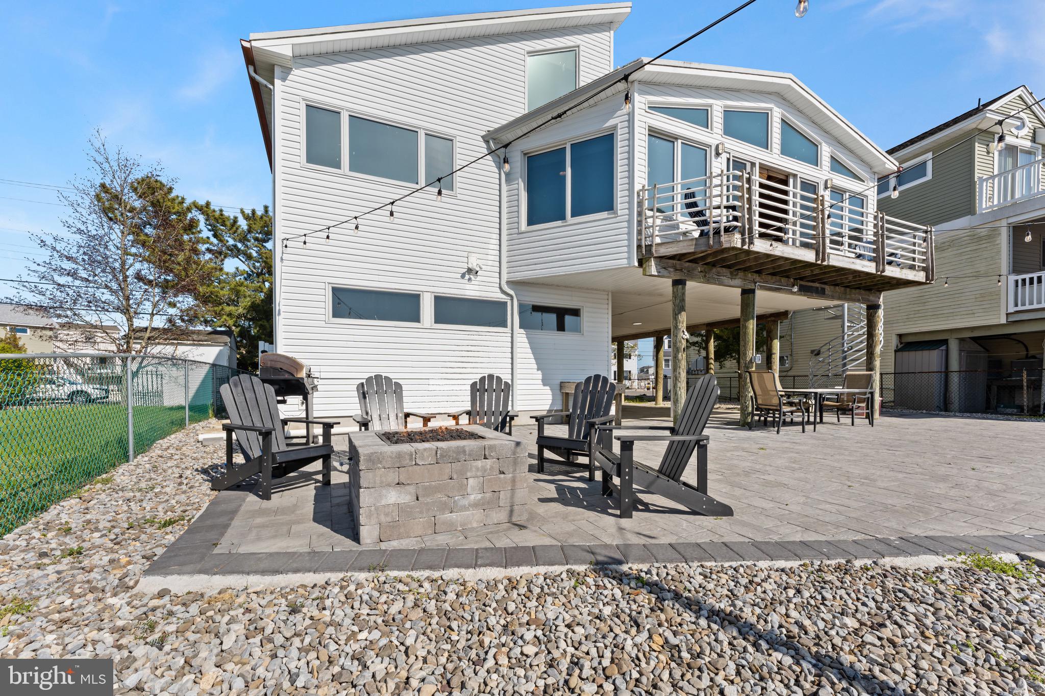 1327 Mill Creek Road Manahawkin, NJ 08050 - Photo 28 of 38 Paver Patio with Gas Fire Pit