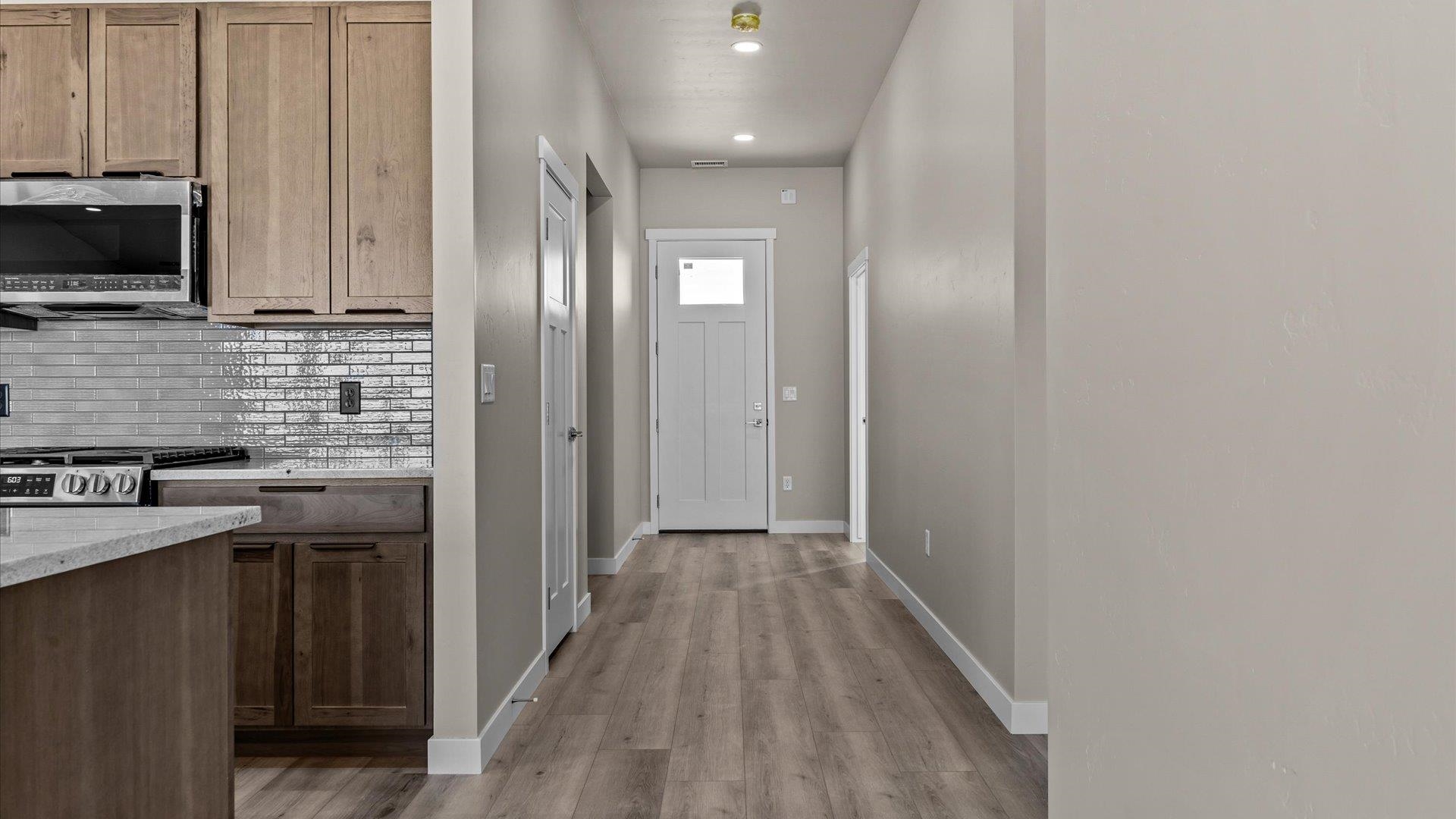 3066 Thunderhead Way Grand Junction, CO 81504 - Photo 9 of 30 a view of a kitchen from the hallway