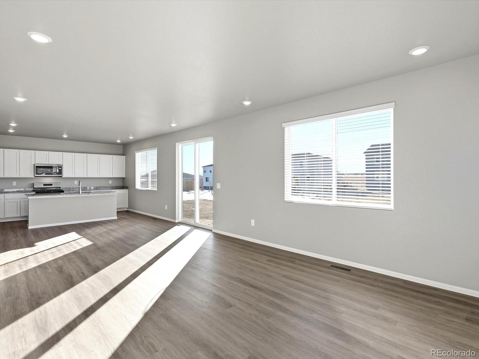 7317 West 27th St Road Greeley, CO 80634 - Photo 6 of 28 a view of kitchen with wooden floor
