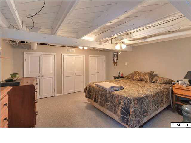 4147 Bacon Hollow Road Dyke, VA 22935 - Photo 13 of 19 Basement Bonus Room, currently being used as Master Bedroom. Basement has since been painted also.