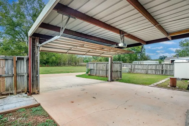 a view of backyard with green space