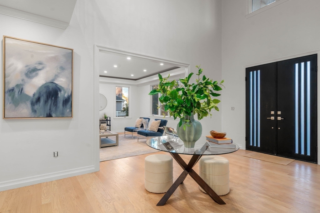51 Pilgrim Road Needham, MA 02492 - Photo 18 of 42 a living room with furniture and potted plant