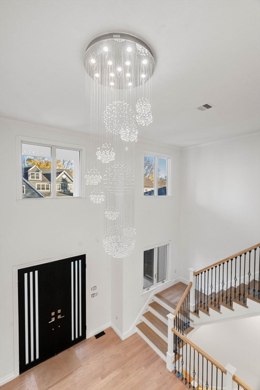 51 Pilgrim Road Needham, MA 02492 - Photo 3 of 42 a bedroom with bed and wooden floor