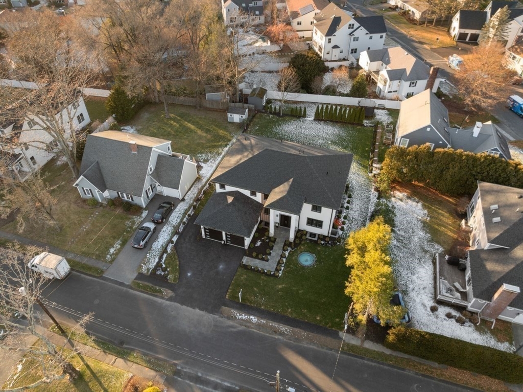 51 Pilgrim Road Needham, MA 02492 - Photo 41 of 42 an aerial view of a house with a garden