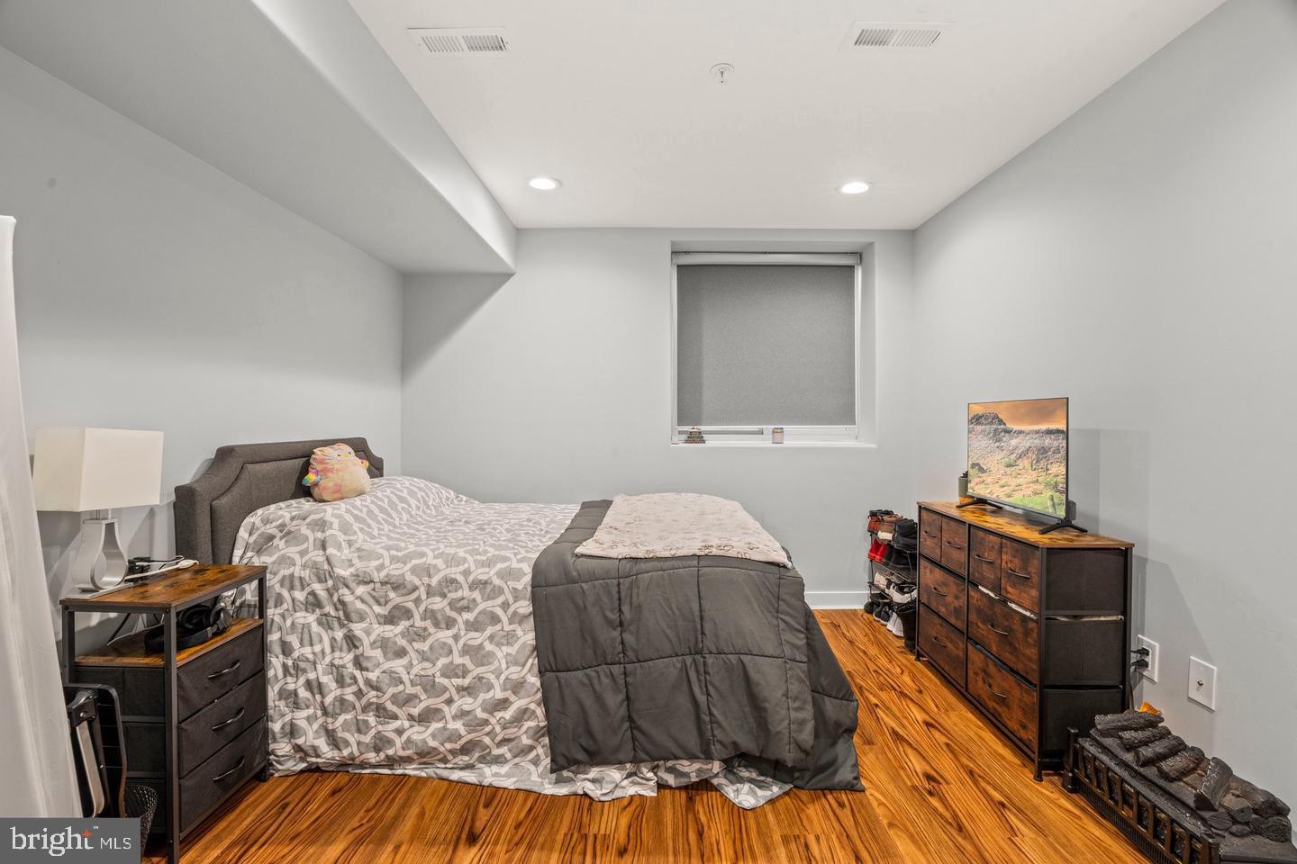 1751 South Taylor Street Philadelphia, PA 19145 - Photo 11 of 28 a bedroom with a bed and a tv