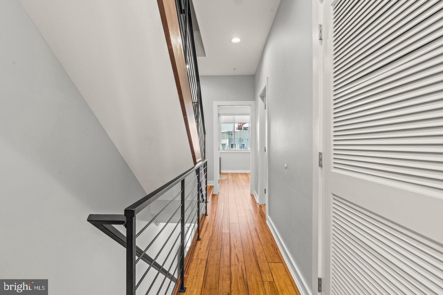 1751 South Taylor Street Philadelphia, PA 19145 - Photo 12 of 28 a view of a hallway with wooden floor and staircase