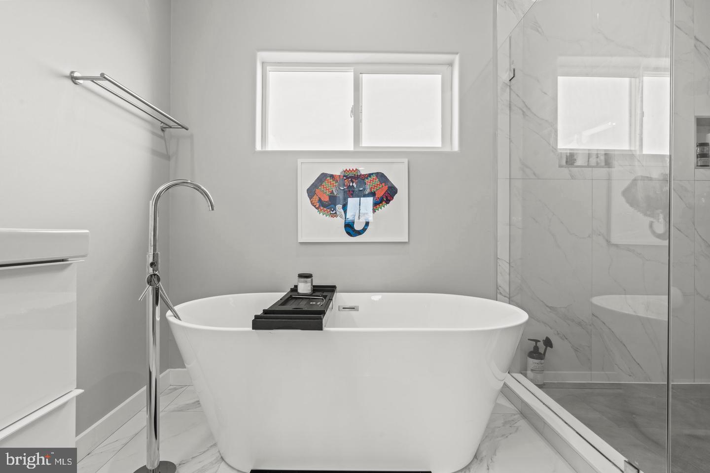 1751 South Taylor Street Philadelphia, PA 19145 - Photo 23 of 28 a white bath tub sitting in a bathroom