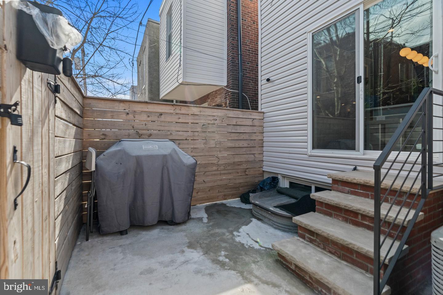 1751 South Taylor Street Philadelphia, PA 19145 - Photo 26 of 28 a view of a house with a door and wooden walls