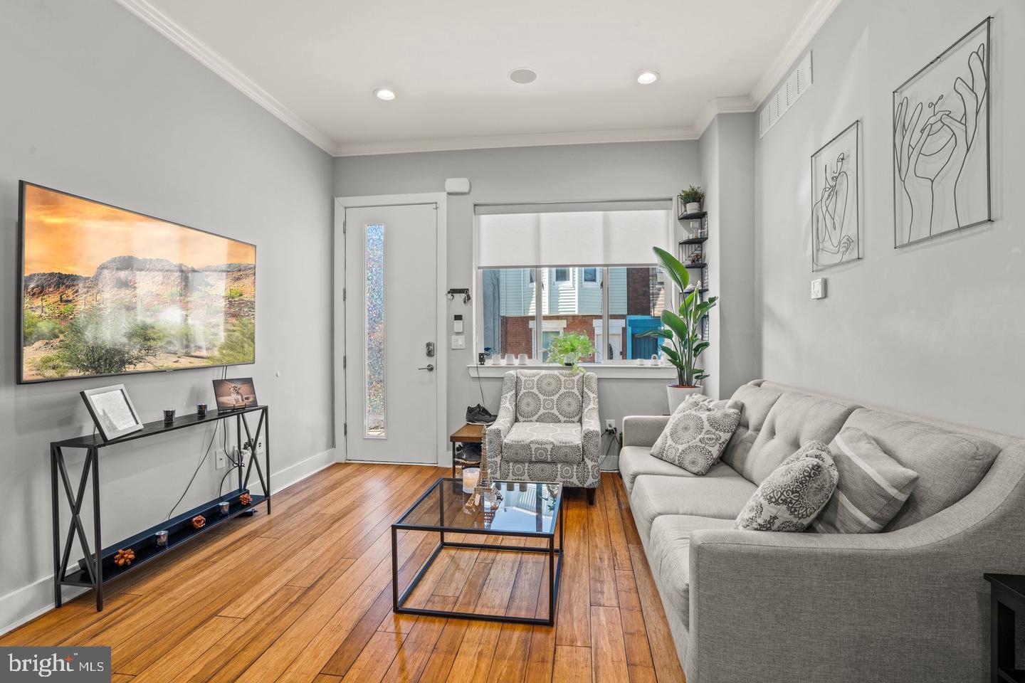 1751 South Taylor Street Philadelphia, PA 19145 - Photo 3 of 28 a living room with furniture and a flat screen tv