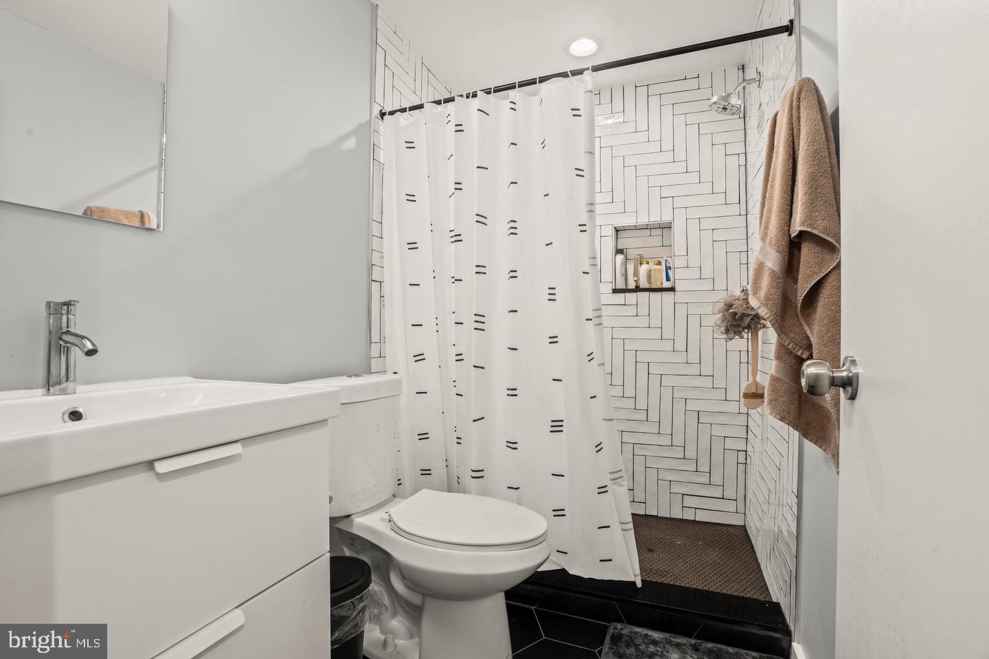 1751 South Taylor Street Philadelphia, PA 19145 - Photo 10 of 28 a bathroom with a sink toilet and shower
