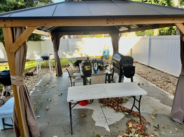 an outdoor space with furniture