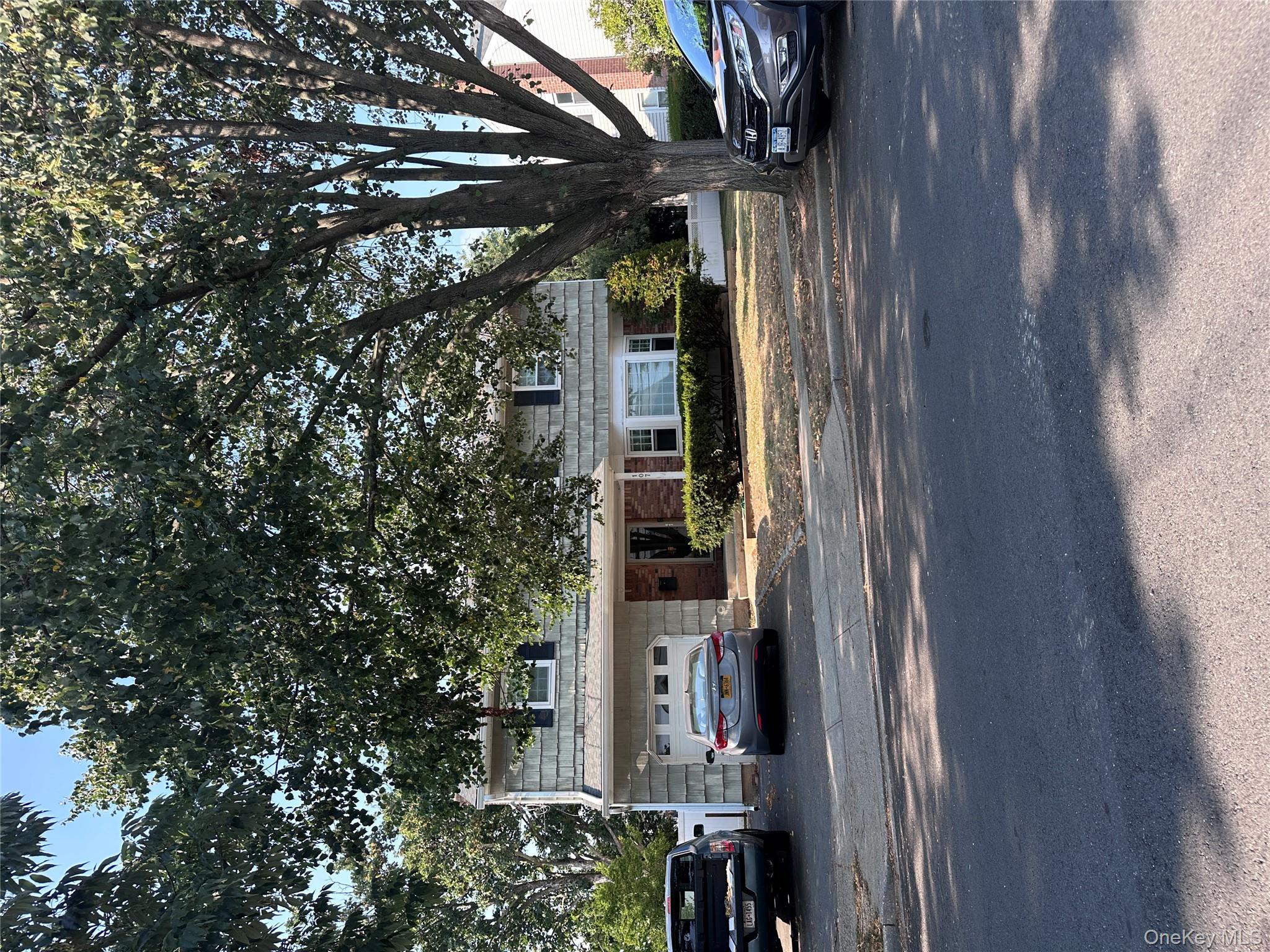 107 Fairview Avenue Oceanside, NY 11572 - Photo 2 of 14 a house view