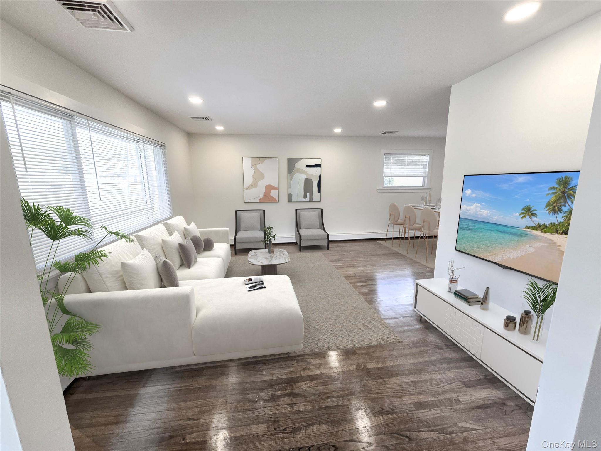 90 Blue Point Road Selden, NY 11784 - Photo 5 of 19 Open concept living space featuring wood-finish flooring and recessed lighting