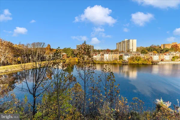 a view of a lake with a building in the background