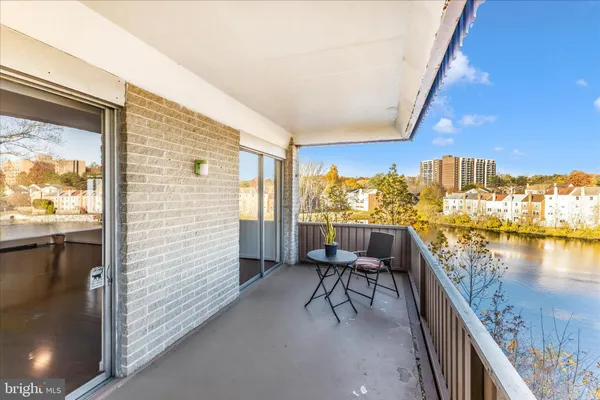 a view of a terrace with furniture