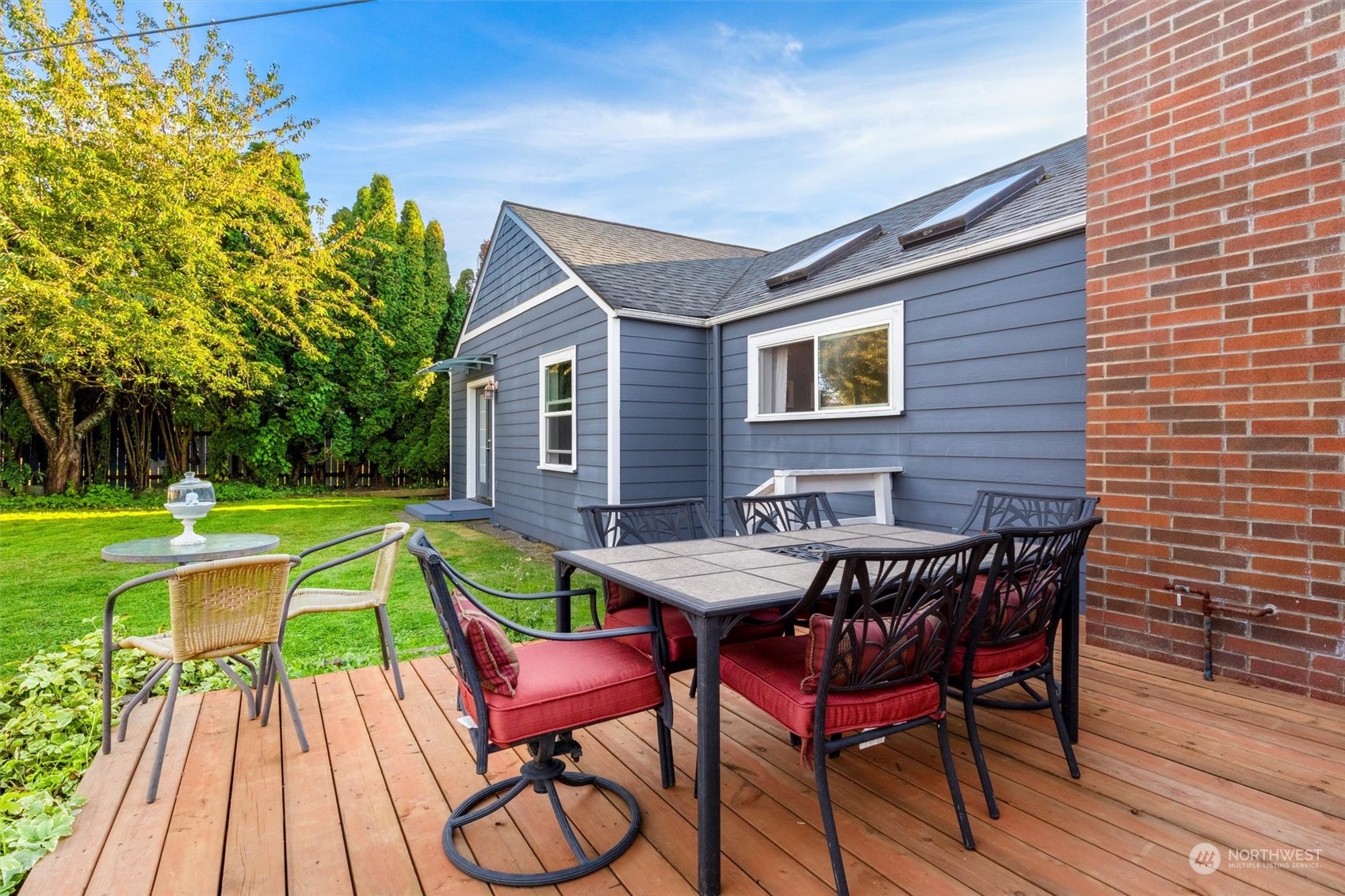 a patio with table and chairs