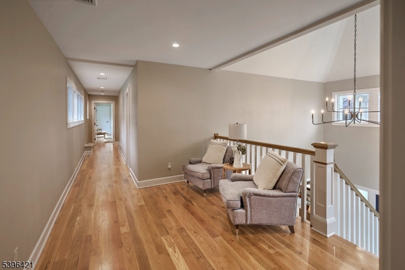 93 Pleasantville Road New Vernon, NJ 07976 - Photo 22 of 41 a living room with furniture and wooden floor