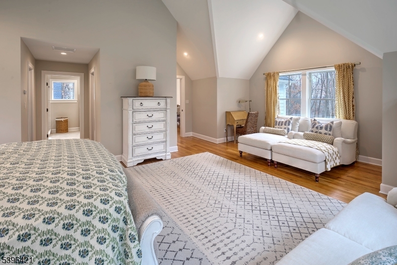 93 Pleasantville Road New Vernon, NJ 07976 - Photo 24 of 41 a bedroom with a bed and a couch