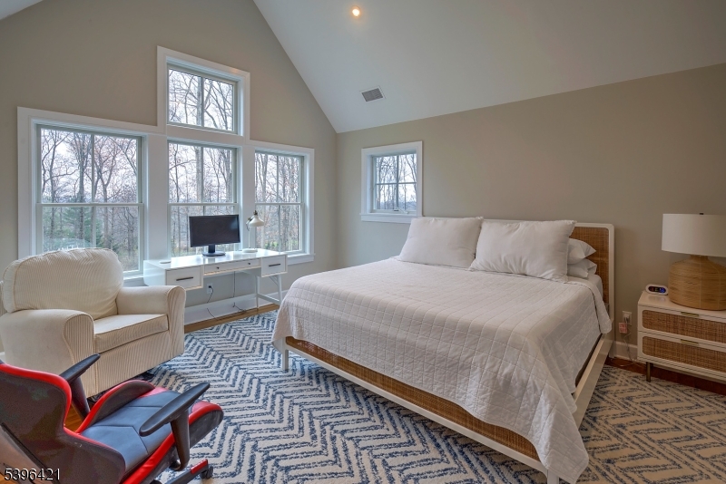 93 Pleasantville Road New Vernon, NJ 07976 - Photo 27 of 41 a bedroom with furniture and a large window