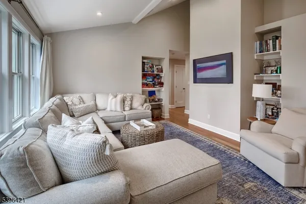 a living room with furniture and a couch