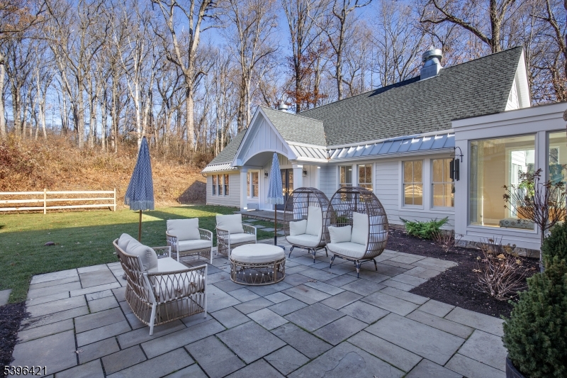 93 Pleasantville Road New Vernon, NJ 07976 - Photo 37 of 41 a front view of a house with garden