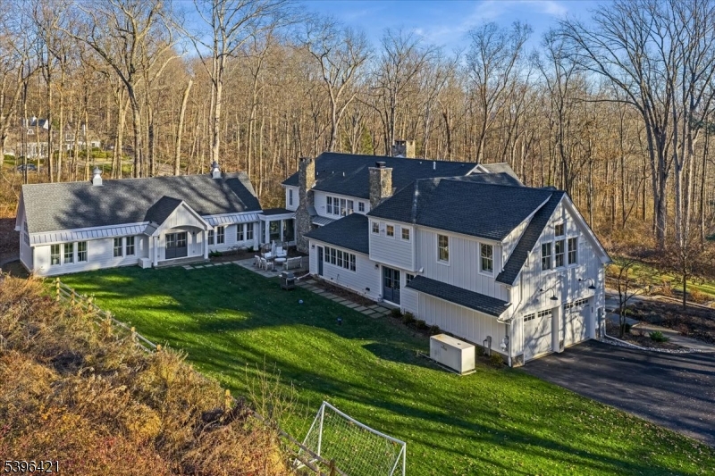 93 Pleasantville Road New Vernon, NJ 07976 - Photo 39 of 41 a view of a house with a big yard