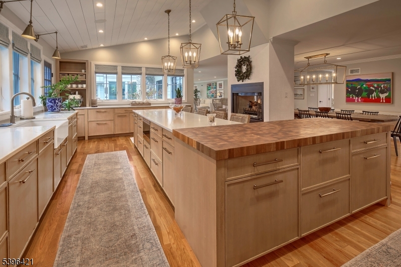 93 Pleasantville Road New Vernon, NJ 07976 - Photo 6 of 41 a large kitchen with kitchen island a large island in it