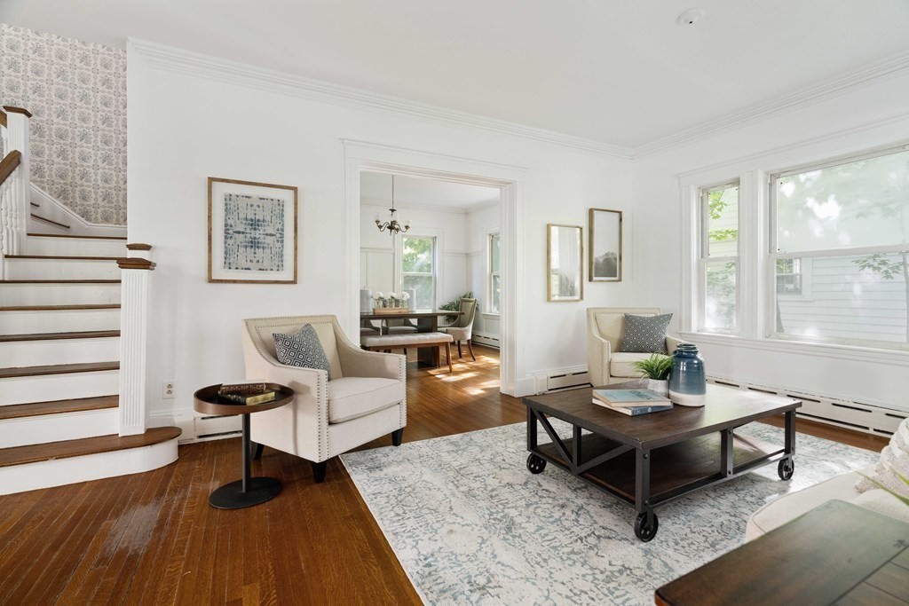 215 Clark Road Brookline, MA 02445 - Photo 20 of 41 a living room with furniture and a wooden floor