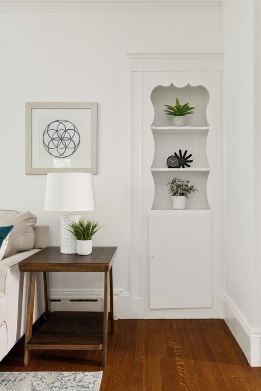 215 Clark Road Brookline, MA 02445 - Photo 22 of 41 a workspace with furniture and wooden floor