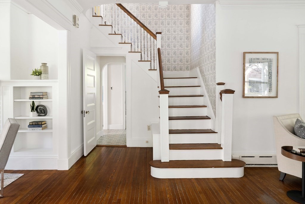 215 Clark Road Brookline, MA 02445 - Photo 26 of 41 a view of a hallway with wooden floor and entryway
