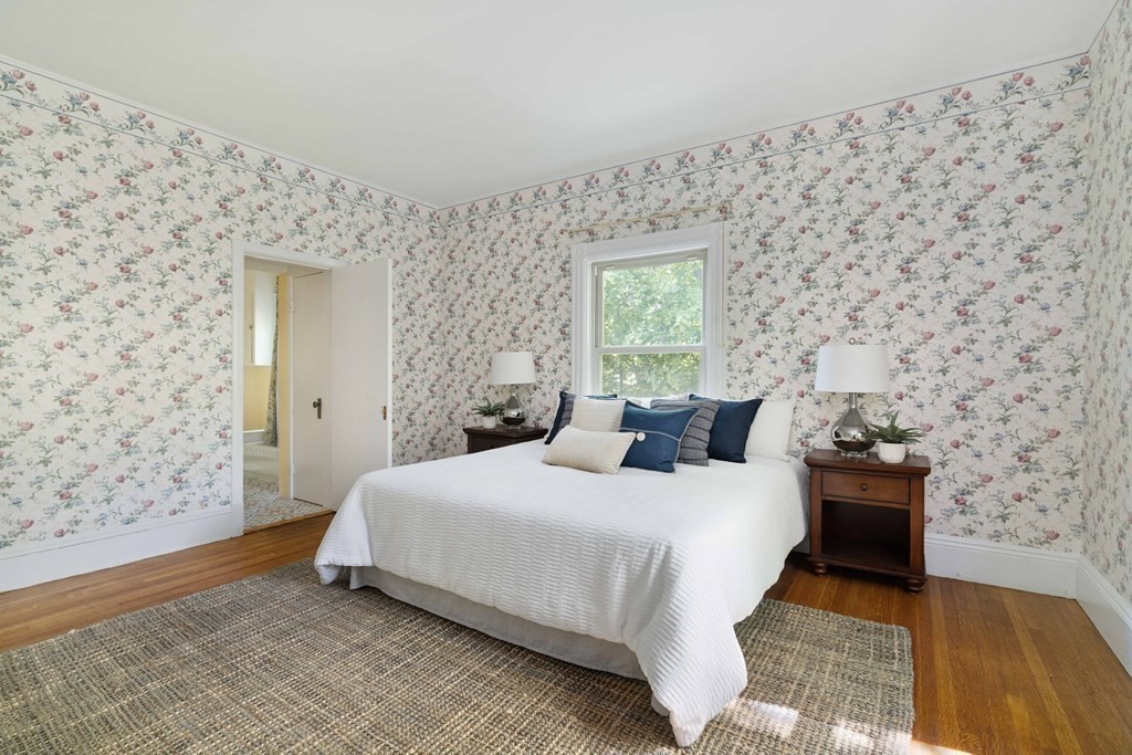 215 Clark Road Brookline, MA 02445 - Photo 30 of 41 a bedroom with a bed and a window